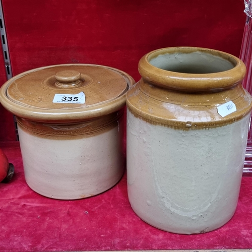 335 - Two vintage stoneware jars including a lidded example. In very good condition.