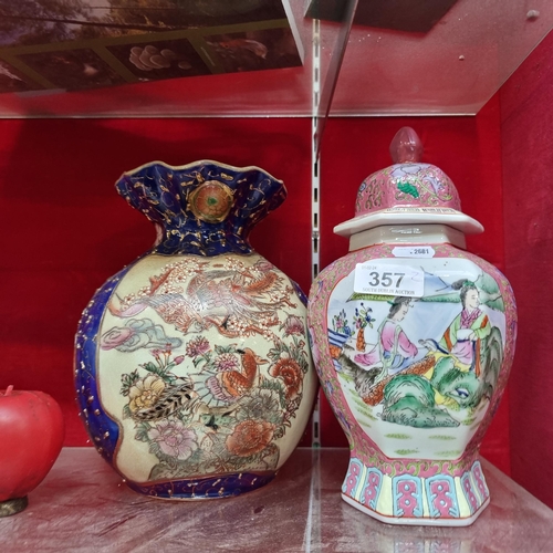 357 - Two attractive Chinese vases including a vintage example with moriage detailing and a famille rose e... 