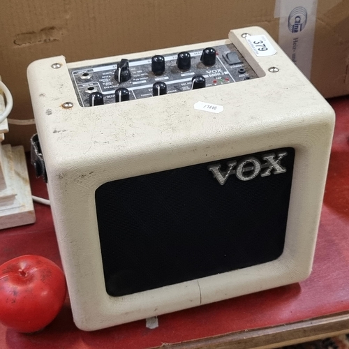 379 - A vintage Vox branded amplifier model MINI3 in a cream finish. Petite in size, super portable.