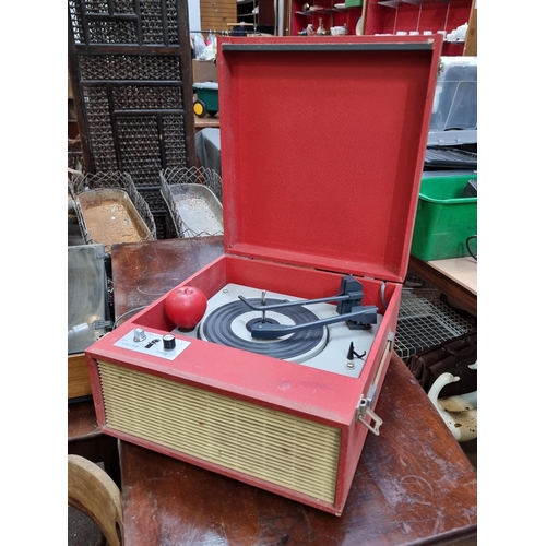 418 - A 1950s BSR record player in a red case.