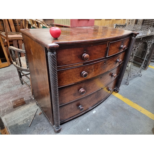 419 - Star Lot : A fabulous Irish bow-fronted chest of drawers with rope twist detailing to sides and five... 