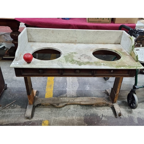 420 - Star Lot : A 19th century marble topped double wash stand with gallery splash back. Marble solid wit... 