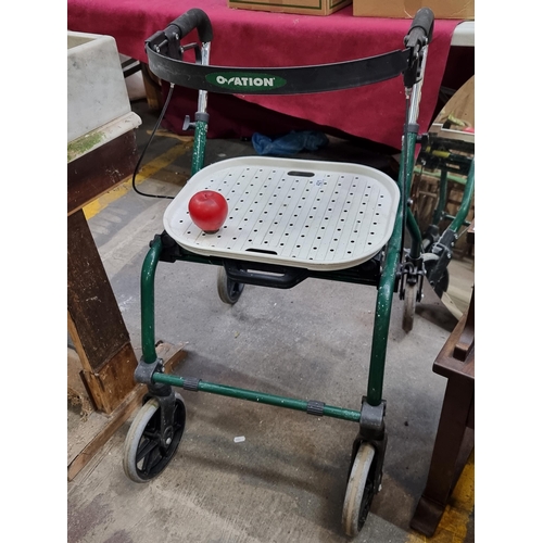 421 - An Ovation branded mobility walker with brakes and carry tray.