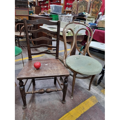 432 - Two vintage chairs including a bent wood bistro example along with a ladderback chair with turned le... 