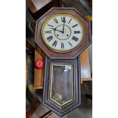 455 - An eight day strike American  Waterbury Regent Wall clock with painted metal face and original Water... 