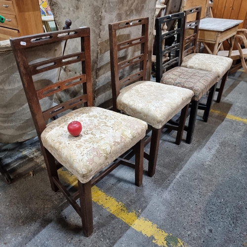 463 - A set of four ladder back oak dining chairs. Provenance: One chair is a different colour.  From the ... 