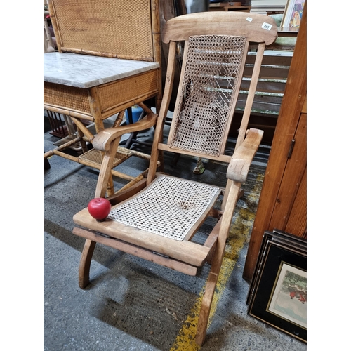 465 - An early 20th century antique rattan folding deck chair. With faults.  From the attic of the amazing... 