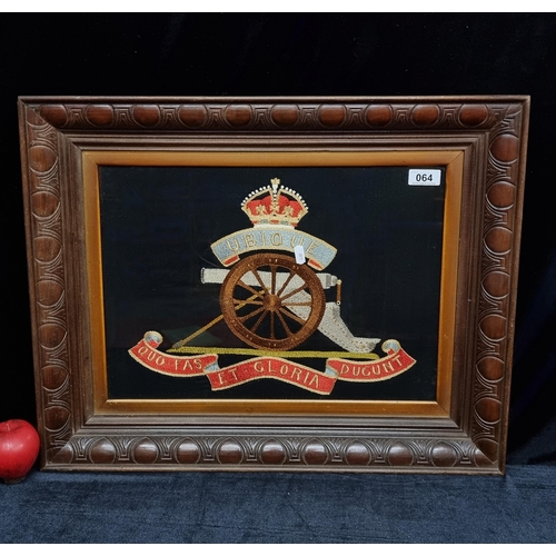 64 - Star Lot : A hand embroidered heraldic crest for the Royal Regiment of Canadian Artillery. Presented... 