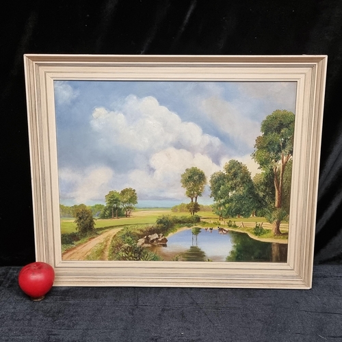 67 - An original oil on board painting featuring a rural landscape scene of rolling fields and a still du... 