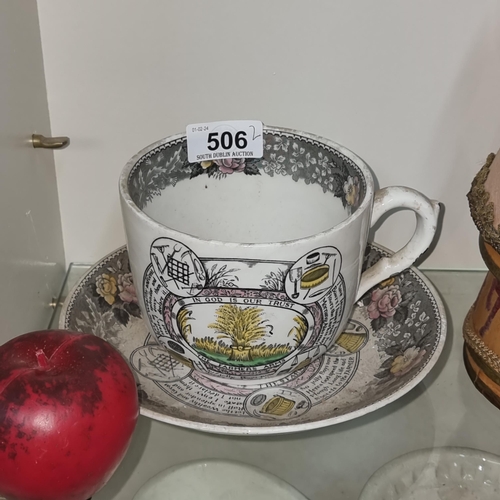 506 - A fantastic large oversized cup and saucer reading 