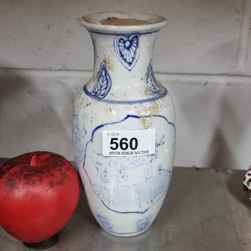 560 - A very heavy early antique Chinese jug with cork stopper, decorated in a hand painted blue and white... 