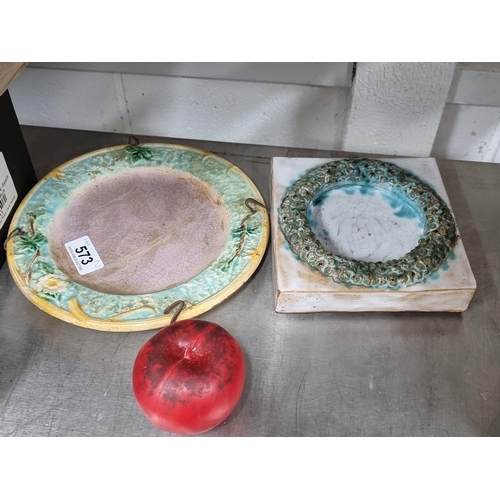 573 - Two antique Majolica  ceramic items including a decorative wall hanging plate with foliate design, a... 