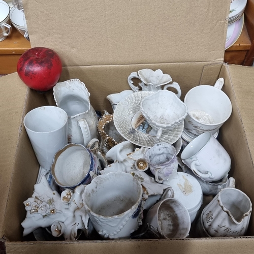 596 - A large box filled with a collection of antique fine bone china in a variety of forms, patterns and ... 