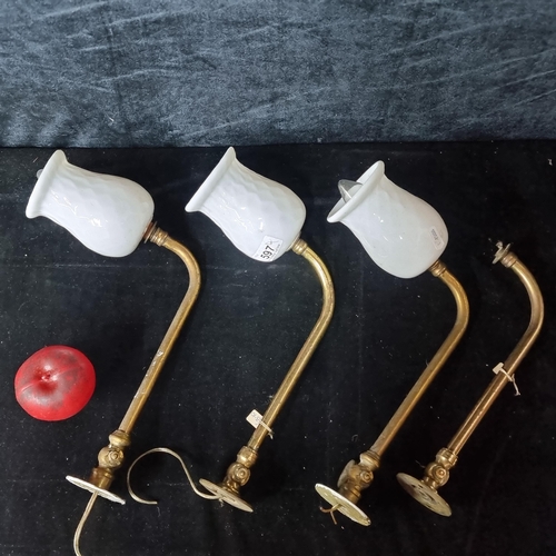 597 - Four vintage sconce lights from GL & CCo. Including three with milk glass shades. From the amazing, ... 