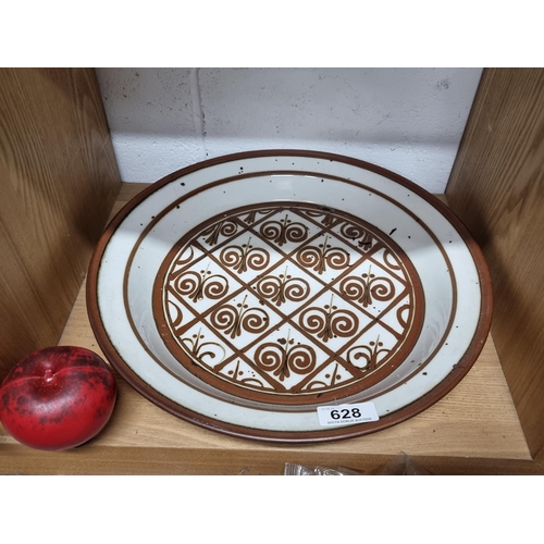 628 - A large mid century Dansk Designs Denmark serving plate with an attractive spiral pattern in a brown... 