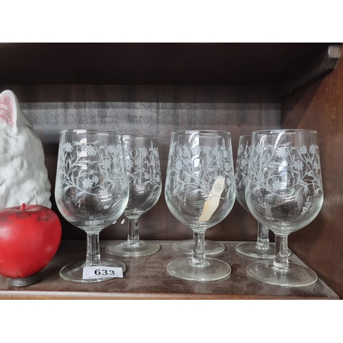 633 - A lovely set of six vintage French made stemmed glasses with an etched floral design. In very good c... 