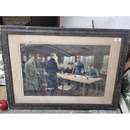 652 - A large chromolithograph print of a painting titled 'The Signing of the Armistice 1916' by Maurice P... 