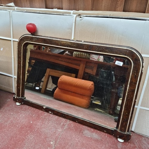 352 - A fabulous wooden napoleon over mantle mirror.