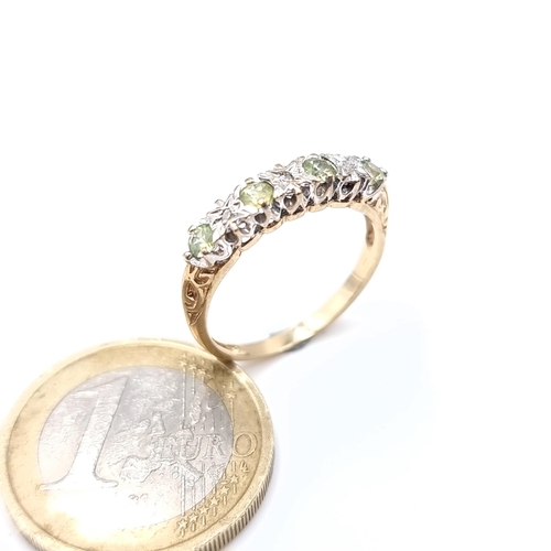 670 - A diamond and lemon quartz 9K gold ring, ring size M, weight 1.81 grams, ring in original box.