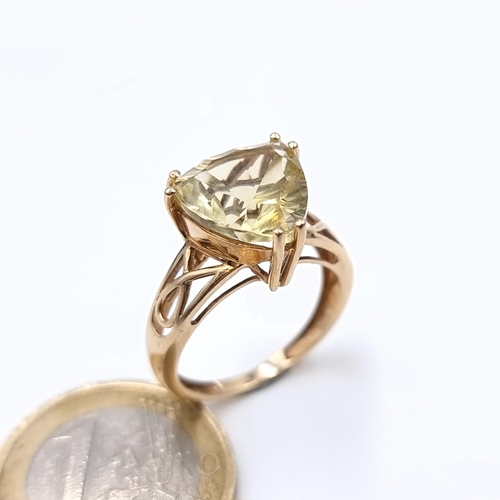 680 - Star Lot : A super large pretty citrine stone ring set in a Celtic style mount, mounted in 9K gold, ... 