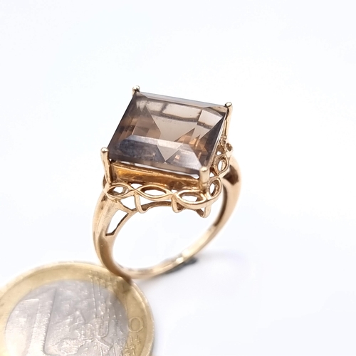 683 - Star Lot : A vintage very large, heavy  smoky quartz crown set stone ring, set in 9K gold, size P, w... 