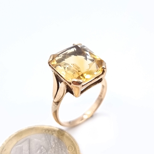 685 - Star Lot : An attractive heavy large citrine stone ring, size O, weight 4.50 grams, boxed.