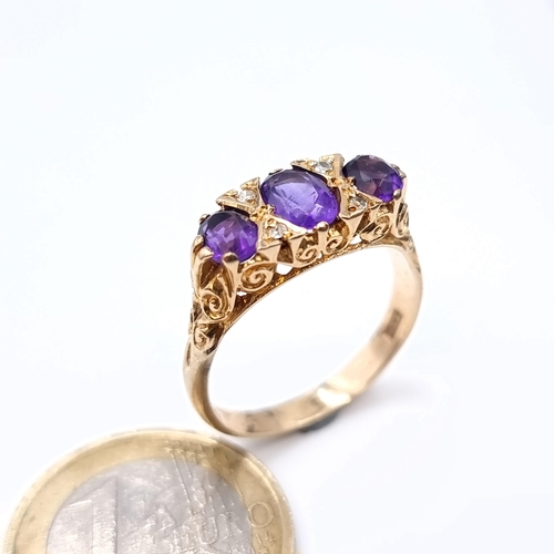 687 - Star Lot : A very pretty antique 9K gold ring, set with 3 amethyst stones with diamond accents, size... 