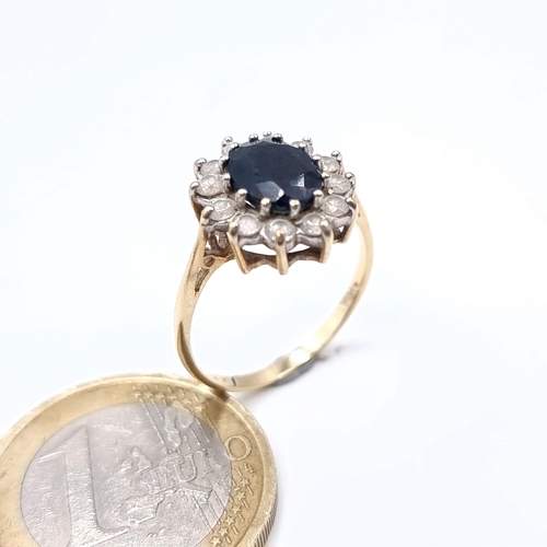 688 - Star Lot : A large sapphire stone ring with gem stone mount set in 9K gold, size M 1/2, weight 2.21 ... 