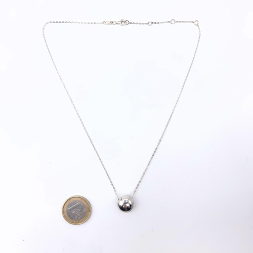 708 - A sterling silver orb and chain, length of chain 42cm, weight 7 grams.