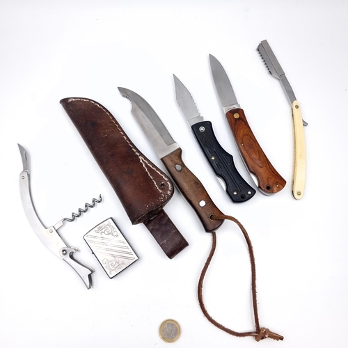 734 - A collection of five knives including a cut throat barbers example and a Ballistech hunting knife to... 