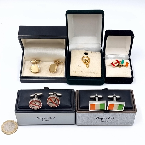 738 - A collection of five items consisting of three pairs of cufflinks together with two tie pins