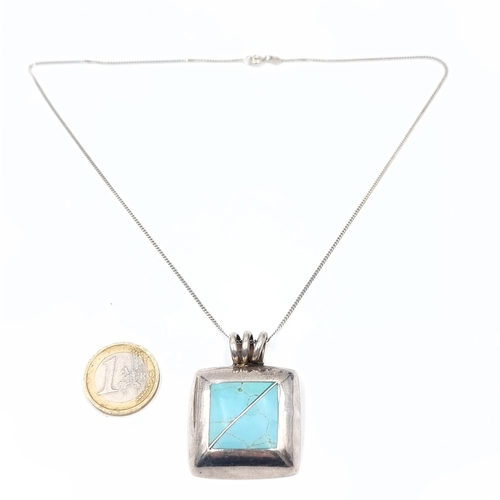 757 - A sterling silver and turquoise pendant chain, length of chain 42cm, weight 26.5 grams.