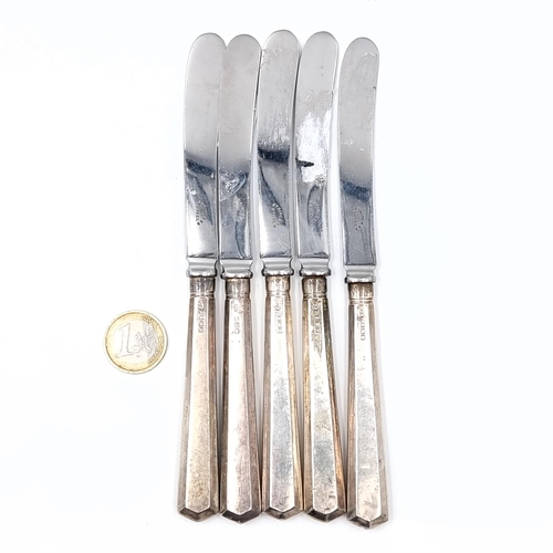 784 - Five sterling silver handle button knives, hallmarked Sheffield.