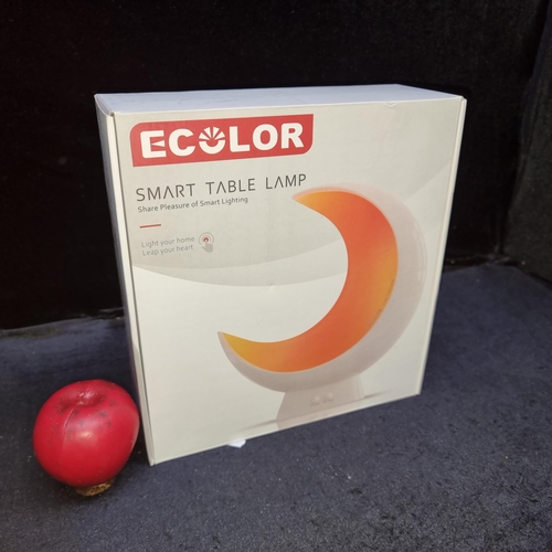 807 - A Ecolor smart table lamp in a crescent moon shape with original box.