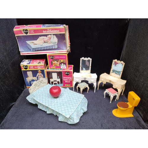 818 - Four great examples of retro Sindy doll accessories including two dressing tables with stools, a toi... 