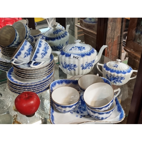 842 - A delightful large 21 piece German tea service comprising of teapot, cups and saucers, all in a beau... 