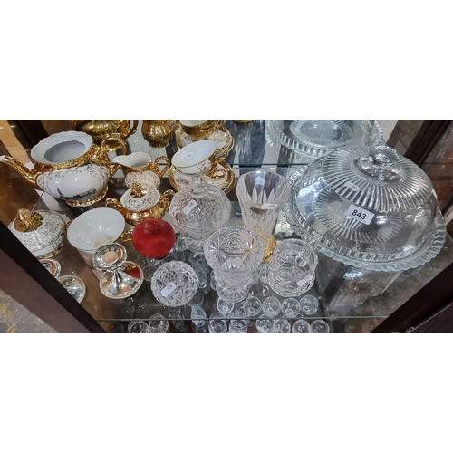 843 - A large mixed lot containing a large selection of glassware along with an elegant Bavarian tea servi... 