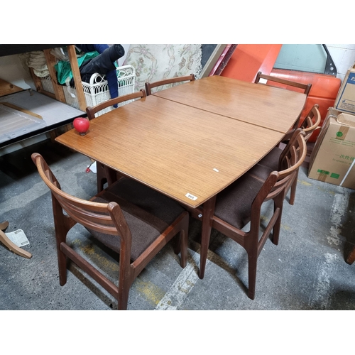 865 - Star Lot : A classy vintage mid century McIntosh teak extending dining table with nice curved top an... 