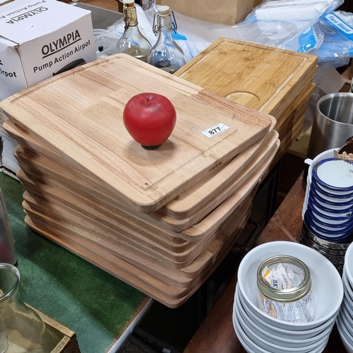 877 - A collection of twenty good quality wooden chopping boards.