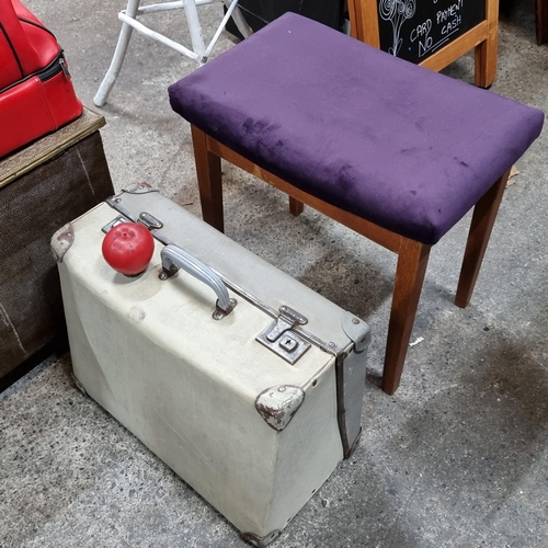 881 - Two items including a vintage hard suitcase along with a stylish stool with a plush purple seat.