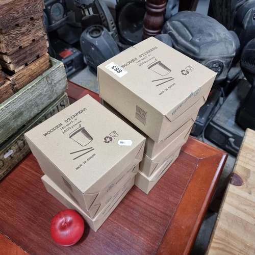 883 - Seven brand new boxes of commercial wooden stirrers for coffee or tea. Approx. 1000 pieces per box. ... 