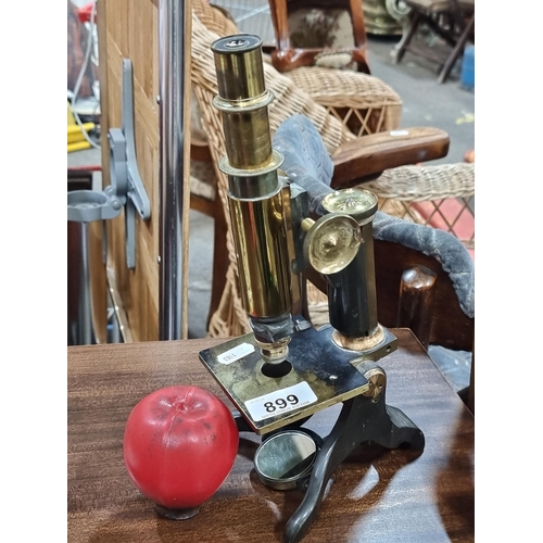 899 - Star Lot : An antique Ernst Leitz Wetzlar brass microscope seemingly with all working parts. Made in... 