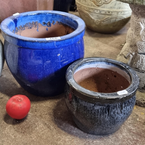 937 - Two attractive terracotta planters with a vibrant blue glaze finish.