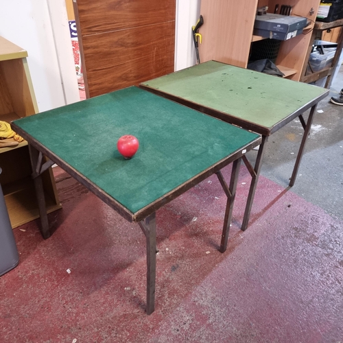 967 - Two antique foldable games tables with green felt baize to top.