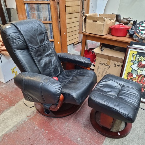 363 - Star Lot : A very stylish Kemi massage chair with matching foot stool with remote controlled vibrati... 