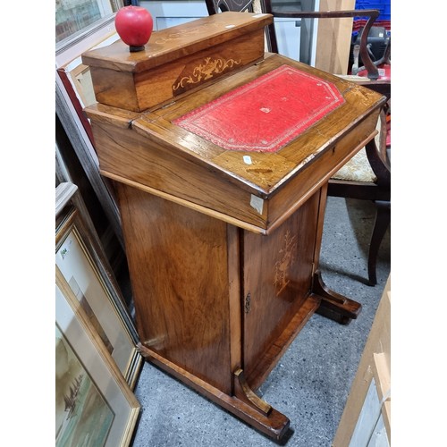 484 - Star Lot : A beautiful Victorian Davenport desk with a writing slope featuring a tooled red leather ... 