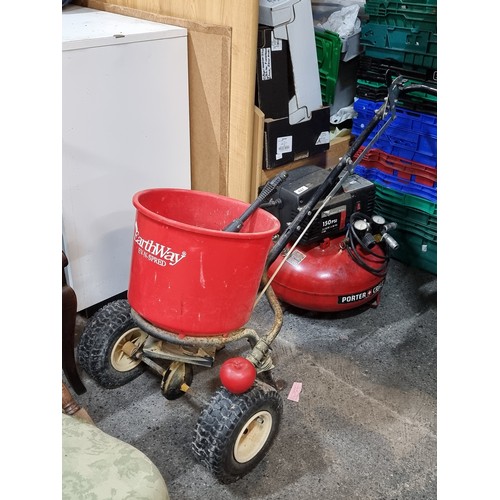 486 - A two-wheel trolley with a bucket used for  salting paths on the estate.  From the gardeners room of... 