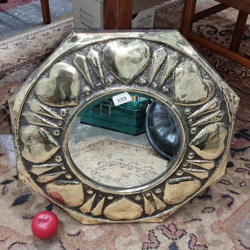 659 - Star Lot : A stunning early arts and crafts hammered brass octagonal heart design mirror very much i... 