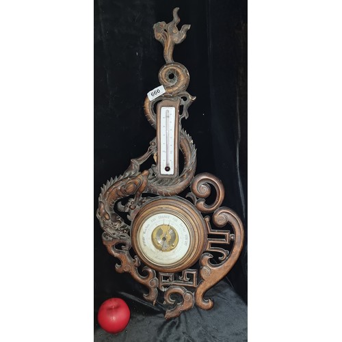 666 - Star Lot A fabulous early 20th century carved wooden French metallic barometer with a highly unusual... 