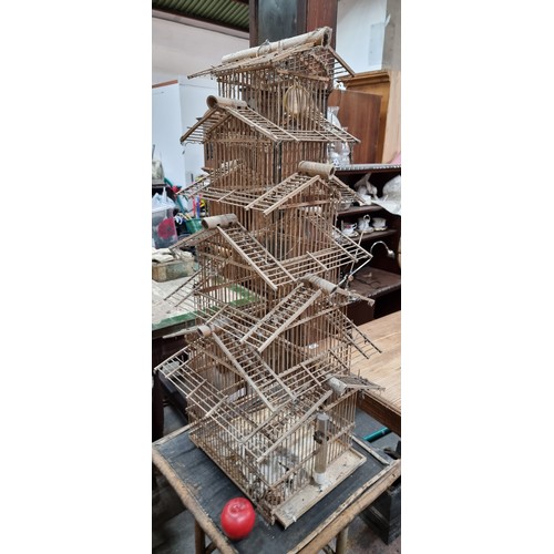 491 - Star lot: A remarkable  and very tall Victorian wooden and bamboo bird cage reminiscent of a pagoda ... 